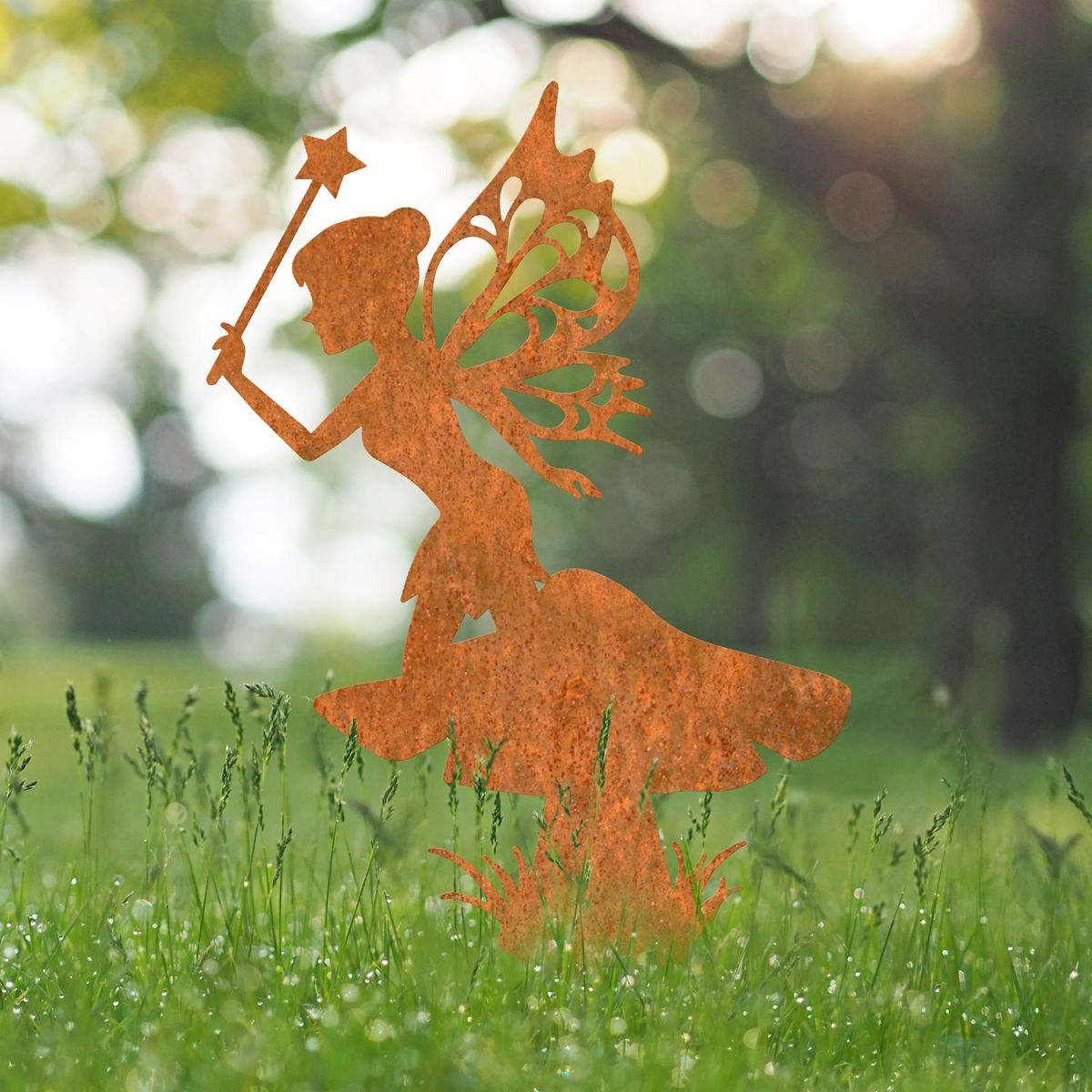 Flower Fairy With Wand Silhouette in Situ in the Garden Flower Fairy With Wand Silhouette in Situ in the Garden