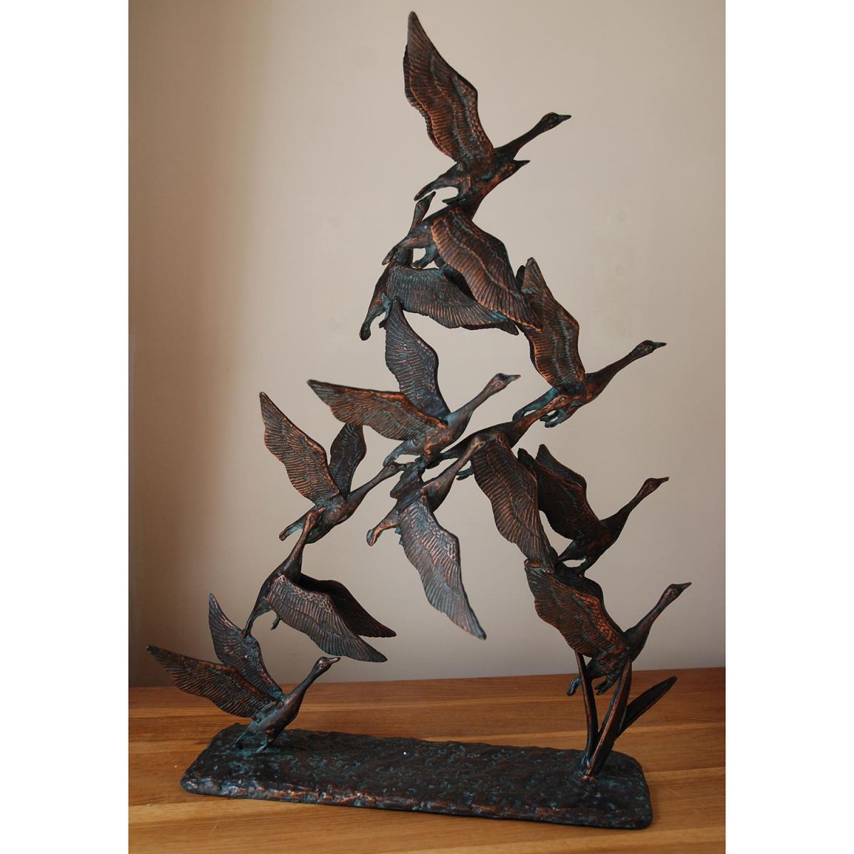Flying Swans Ornament in a Verdigris Antique Bronze Finish