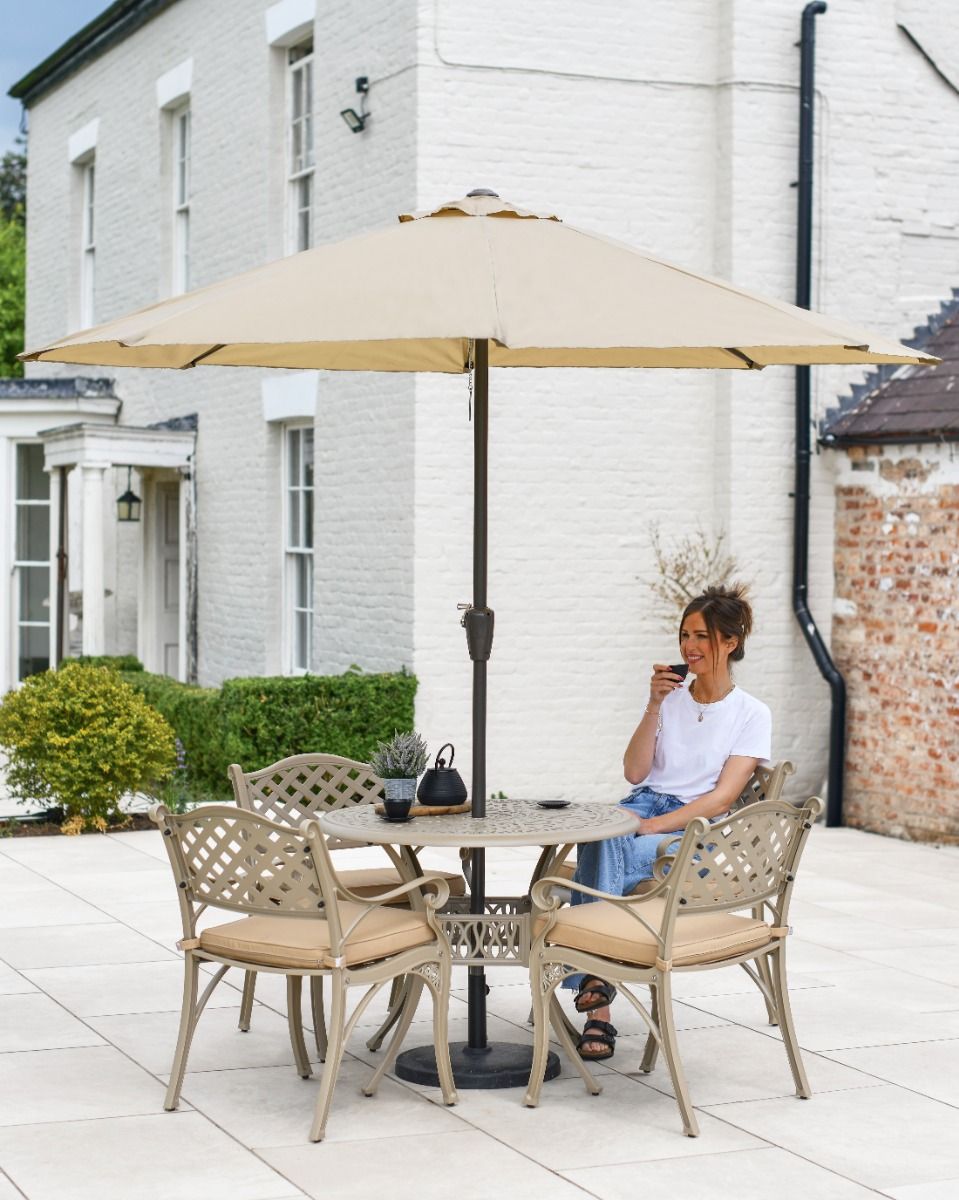 Woman Sat at Champagne Garden Table and Chairs 