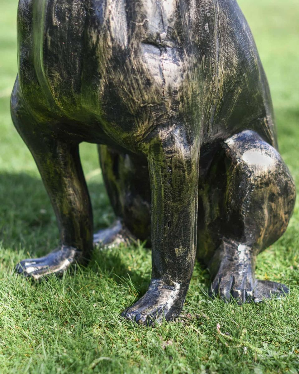 Close-Up of Freestanding Cast Aluminium Sitting Bulldog Garden Sculpture in Situ