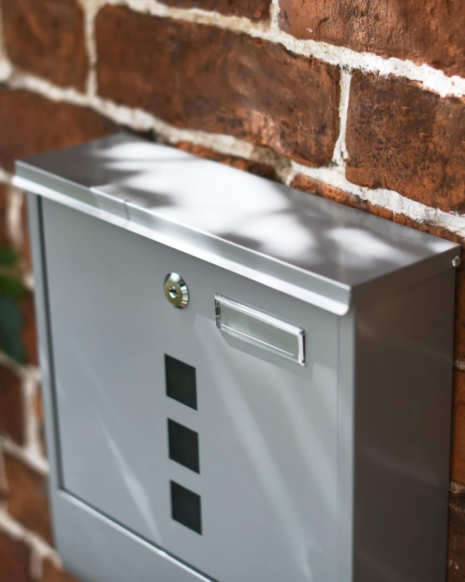 Close-Up of Galvanised Steel Silver Wall Mounted Post Box with Lock & Newspaper Holder Close-Up of Galvanised Steel Silver Wall Mounted Post Box with Lock & Newspaper Holder