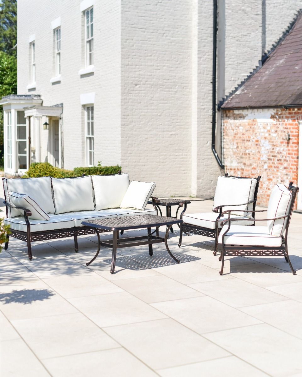 Wide shot of full "Elmswood" five seater furniture set - Sofa, two chairs and two tables