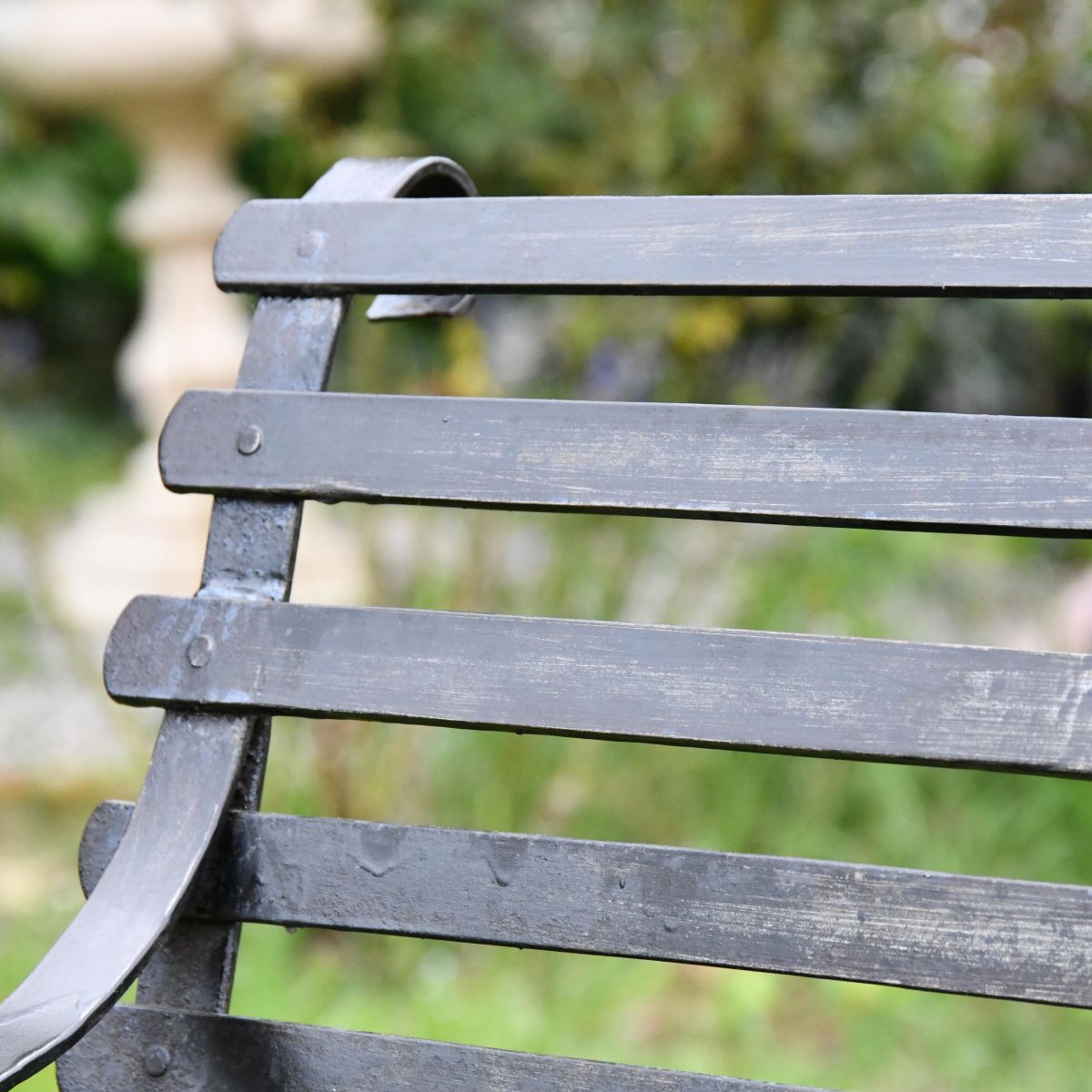Black Two Seater Park Bench Backrest Close-Up Black Two Seater Park Bench Backrest Close-Up