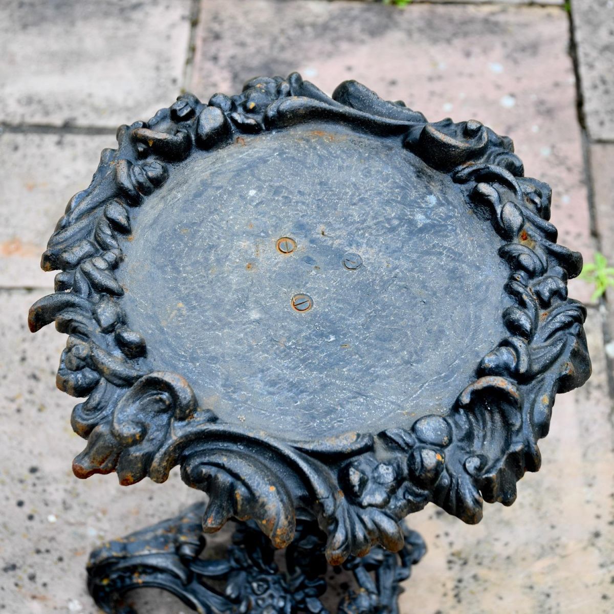 Close up of Cast Iron Table Top in Aged Black Finish Close up of Cast Iron Table Top in Aged Black Finish