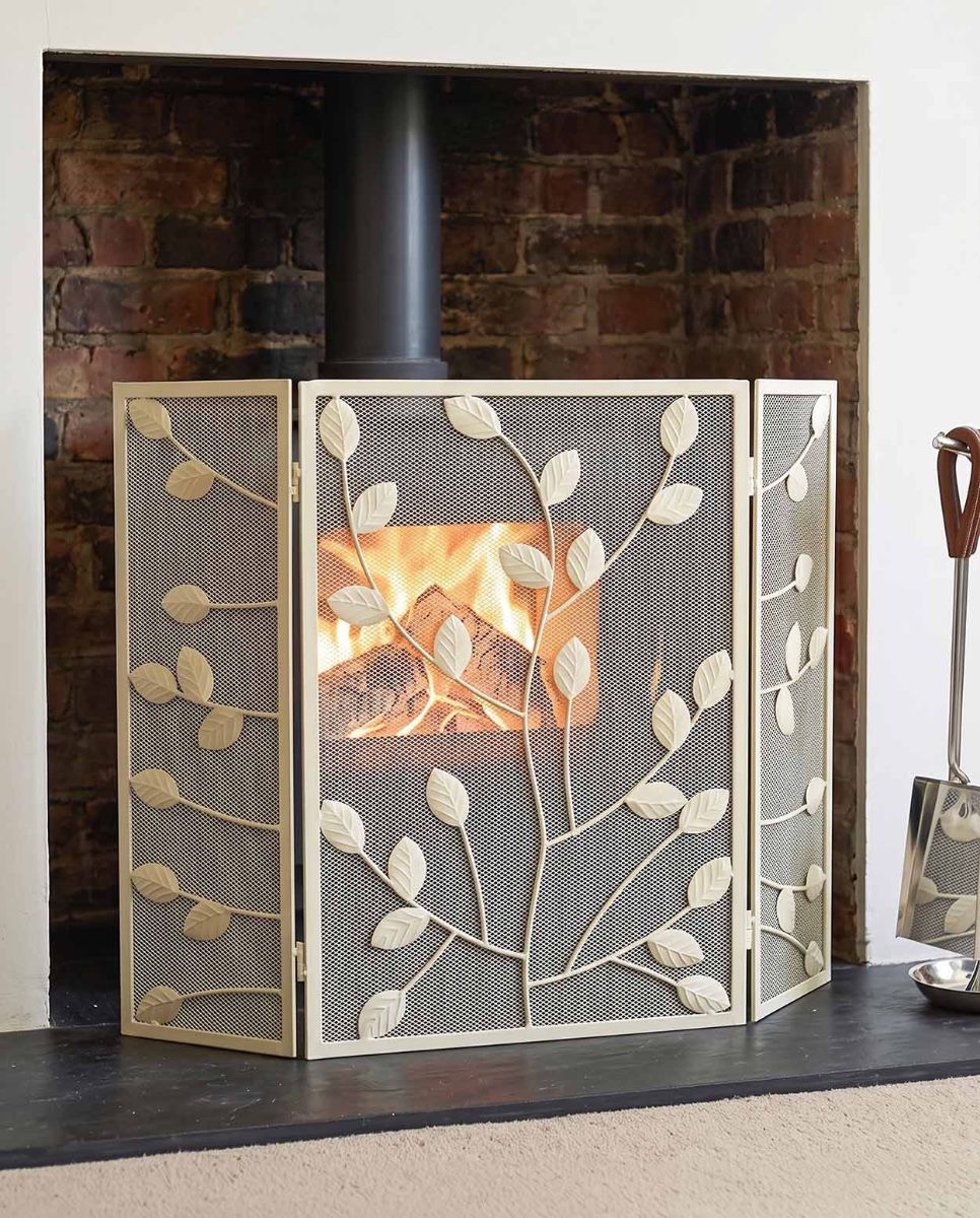 Cream Rectangular Three Fold Fire Guard with Leaf Pattern in Front of the Fireplace Digital illustration
