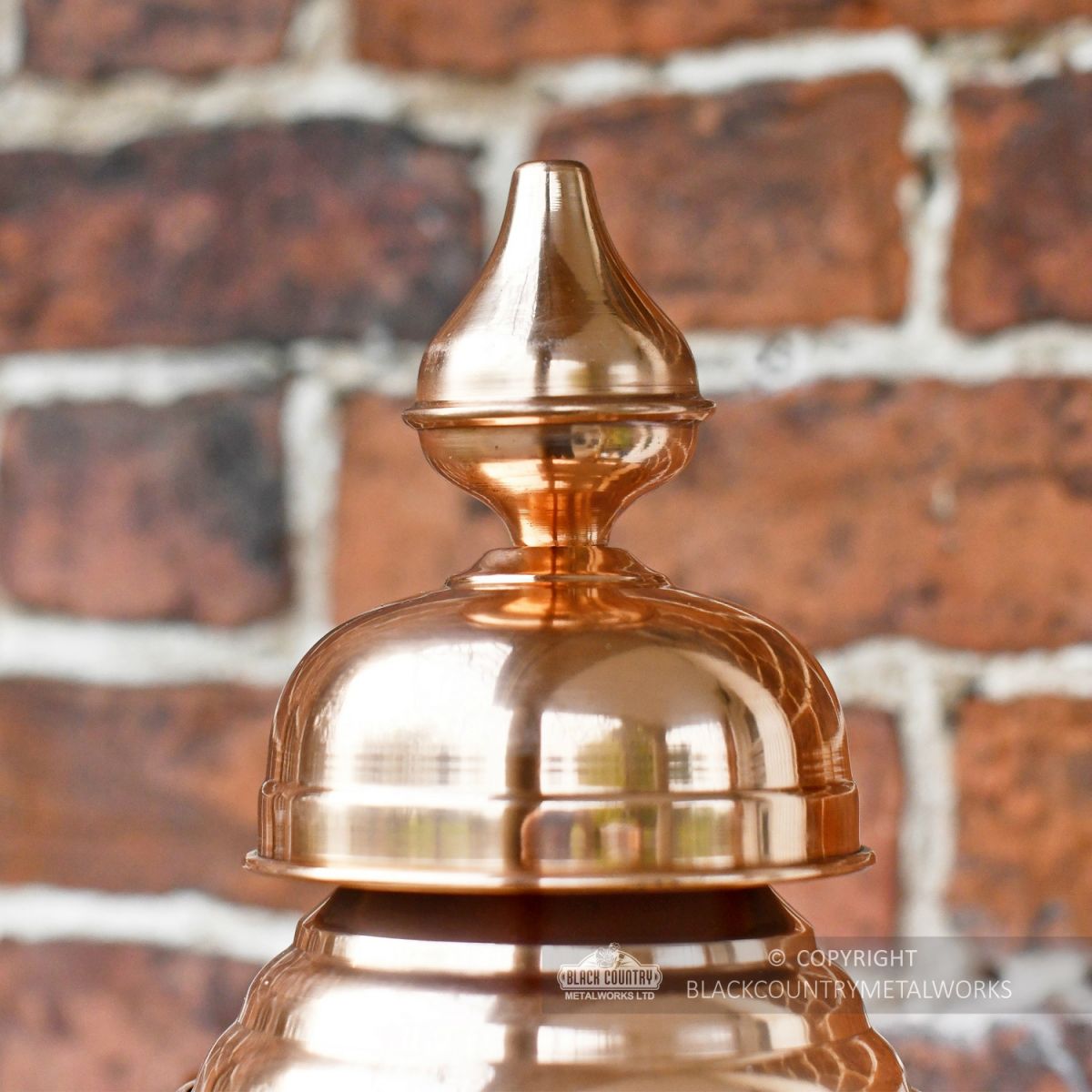 Genuine copper finial on hexagonal lantern