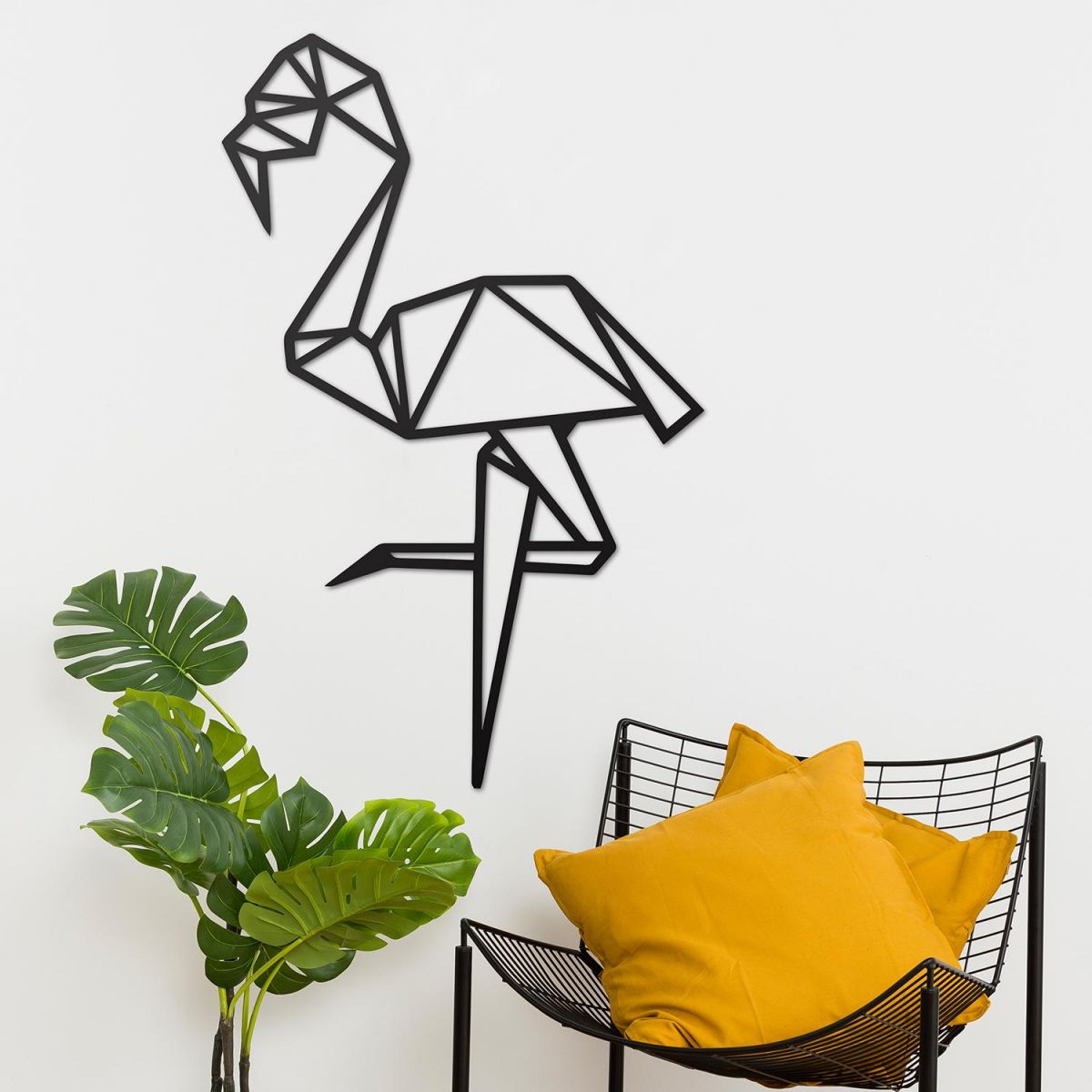 Geometric Flamingo Wall Art on the Wall Next to Plants