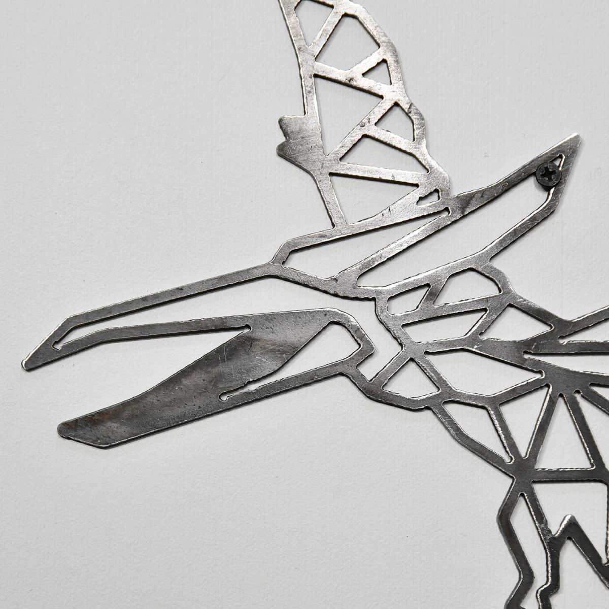 Close-up of the Geometric Design on the Natural Steel Pterodactyl Wall Art