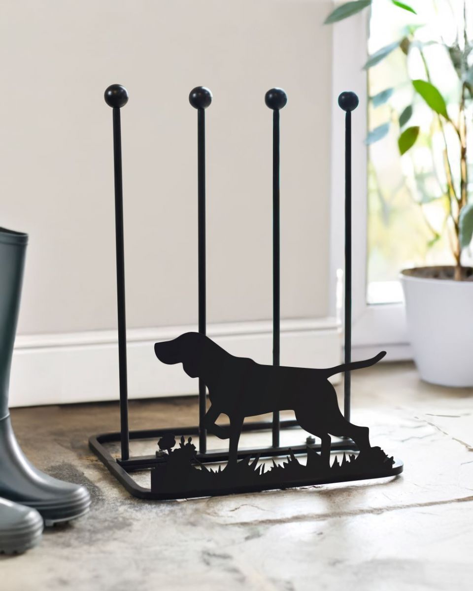 German Pointer boot rack with white wall behind
