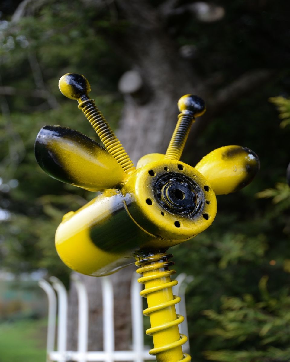 ‘Stretch’ Upcycled Gas Bottle Giraffe Garden Sculpture - Yellow close up of back of head