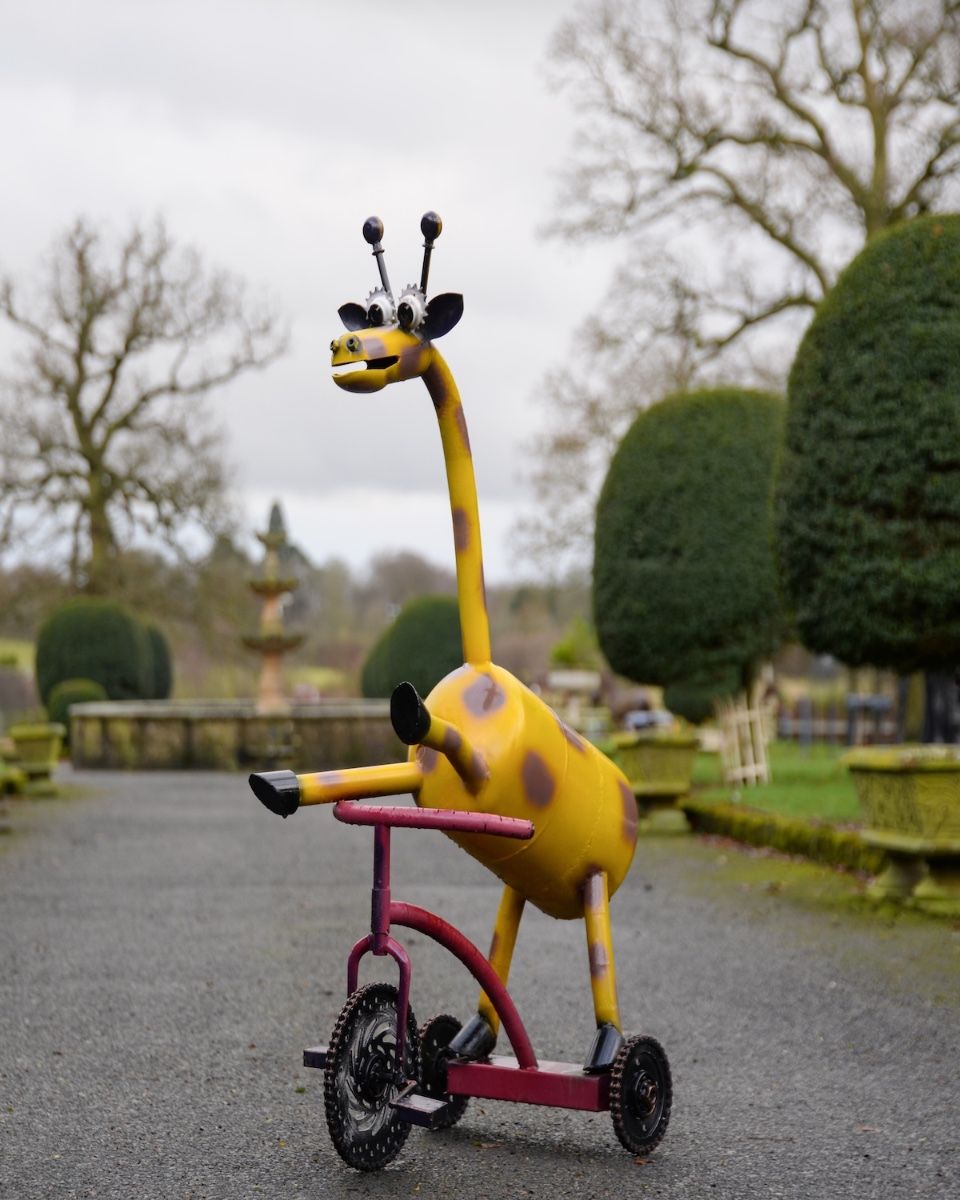 ‘Freewheeler” the Upcycled Metal Giraffe Garden Sculpture on a Tricycle main image