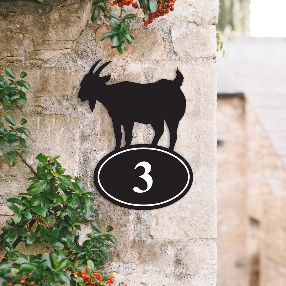 Bespoke Goat Iron House Number Sign on a Garden Wall