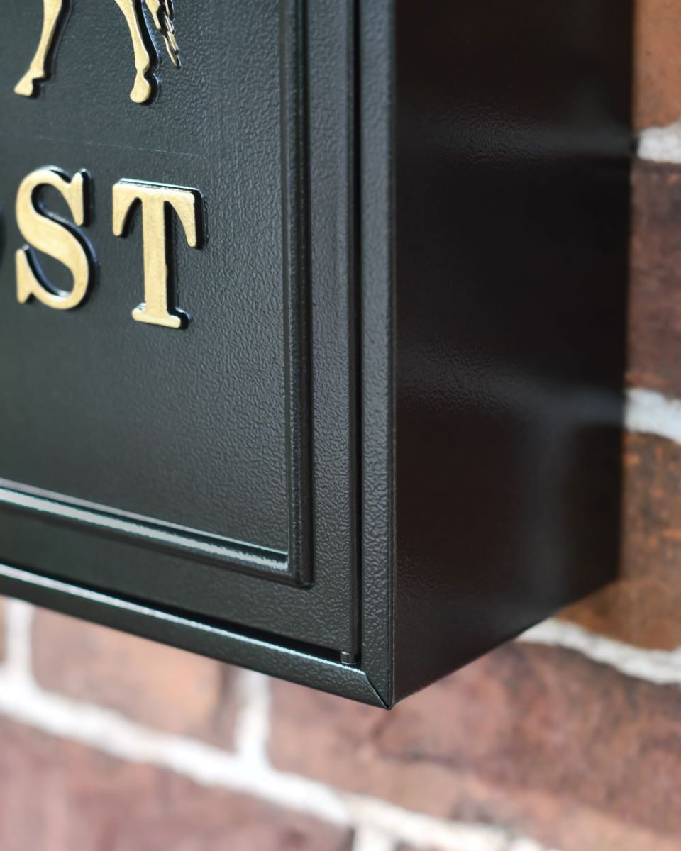Close up of Gold Horse Wall Mounted Post Box frame Close up of Gold Horse Wall Mounted Post Box frame