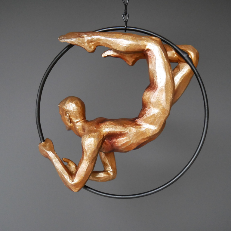 Side View of the Gold Painted Hanging Acrobat Man Ornament