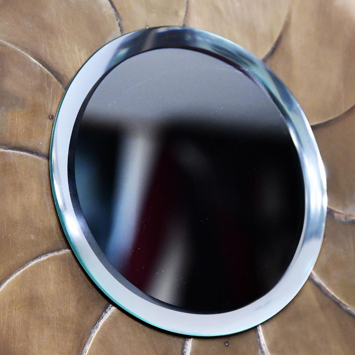 Close-up of the Round Mirror in the Center