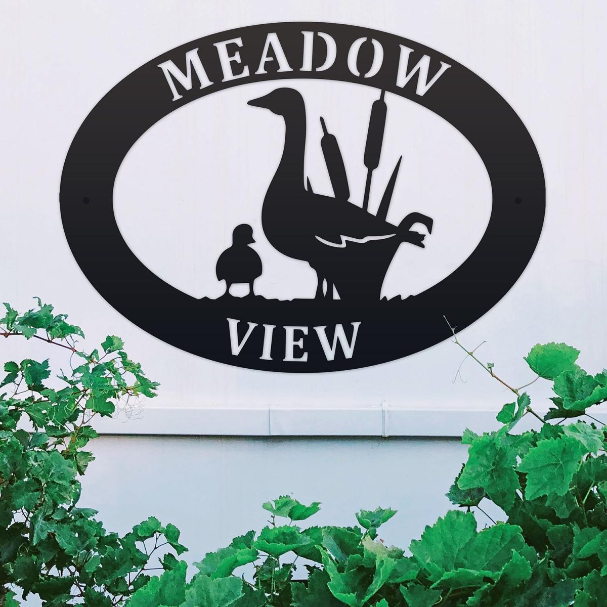 Goose & Gosling Iron Oval House Sign in situ