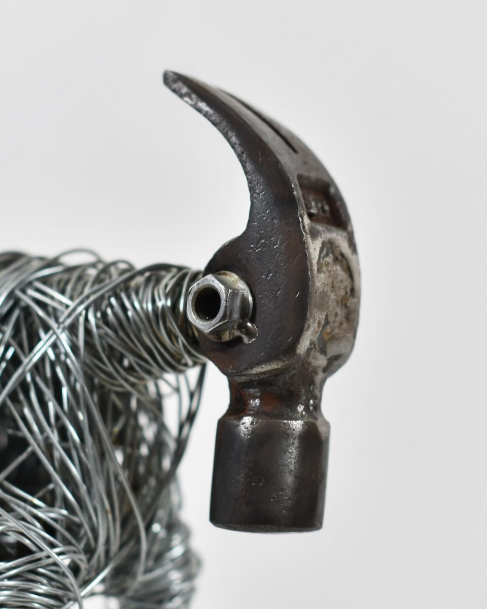 Close up of face detail on recycled metal art sculpture Close up of face detail on recycled metal art sculpture