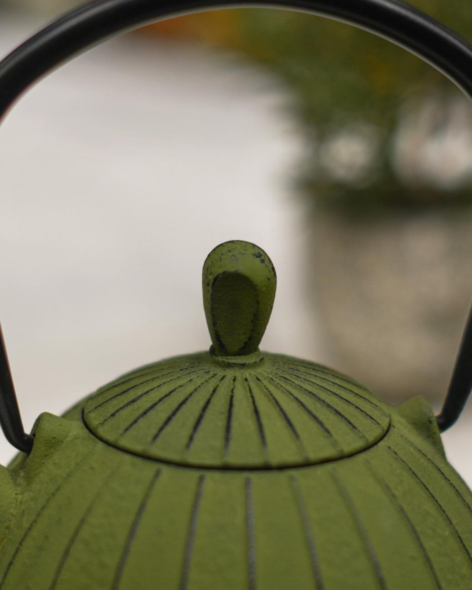 Close-Up of Handle and Teapot Lid