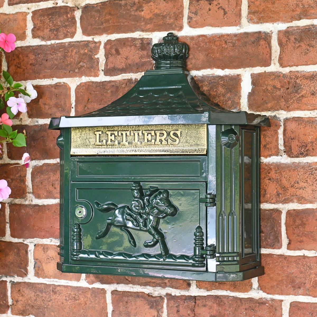 Green "Odell" Wall Mounted Post Box in Situ Outdoors