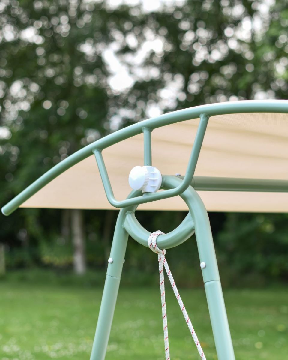 Green Rattan Swing Seat Sun Shield and Frame Close Up