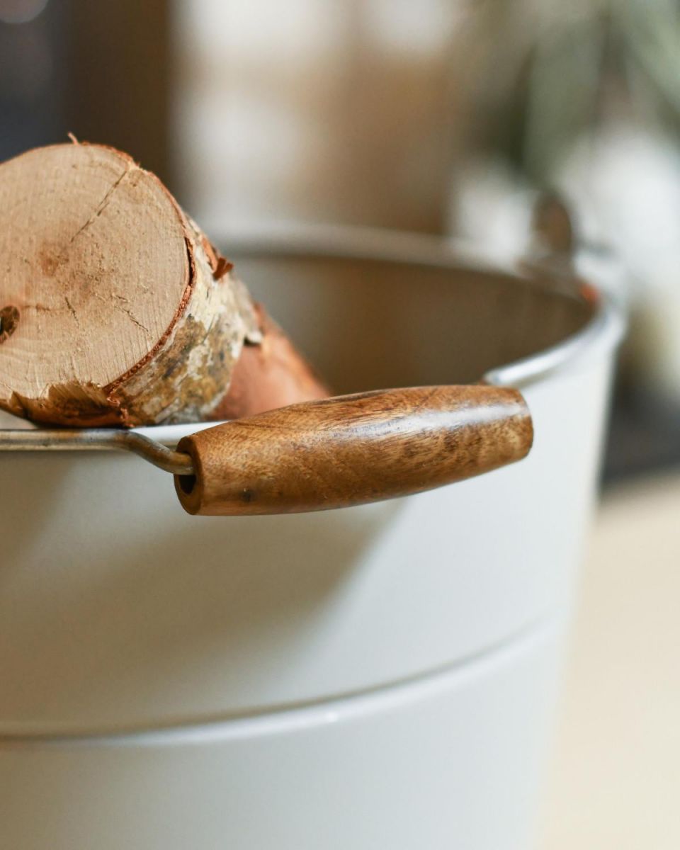 Close Up Of Grey "Kindling" Log Store Bucket Wooden Handle