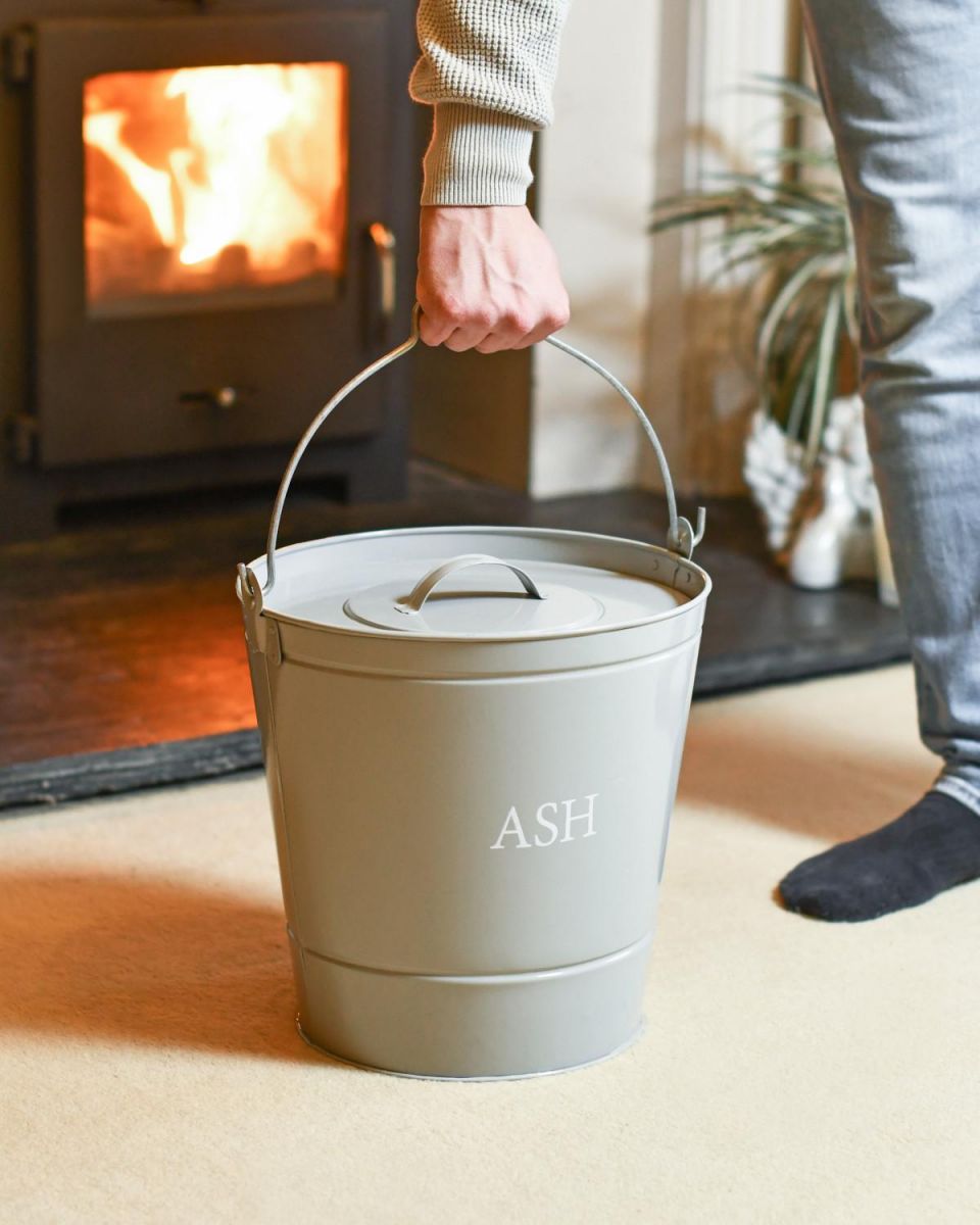 Scale Shot Of Grey Ash Bucket with Lid Scale Shot Of Grey Ash Bucket with Lid