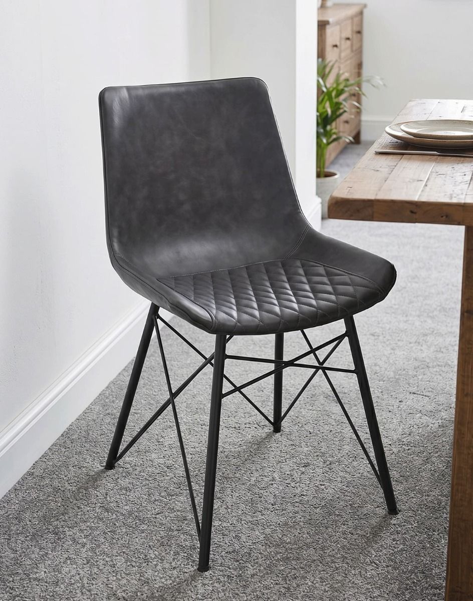 The Grey Leather Dining Chair in a Modern Carpetted Dining Room - Digital Illustration