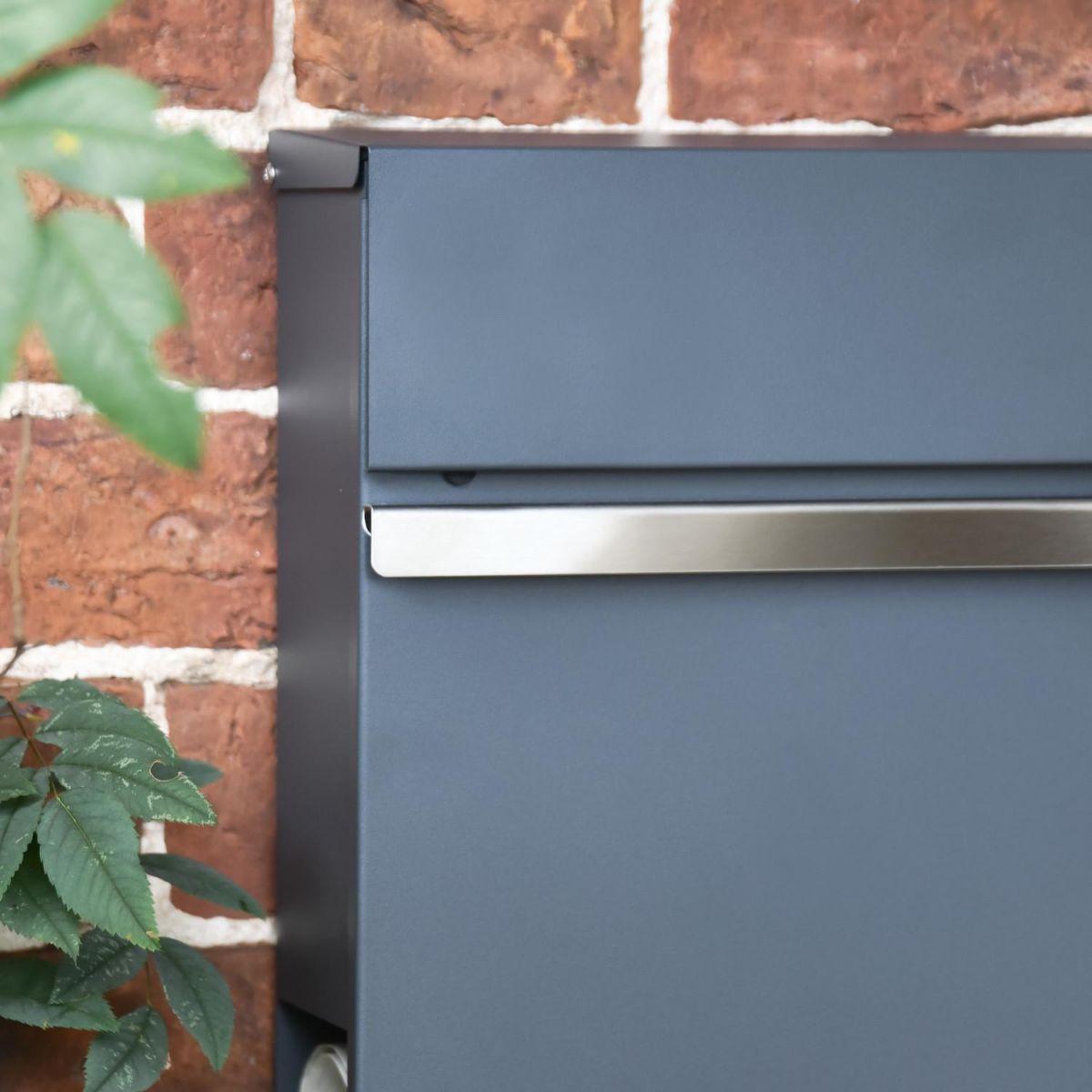 Close-Up of Silver Band on "Harmonious" Wall Mounted Post Box & Newspaper Holder
