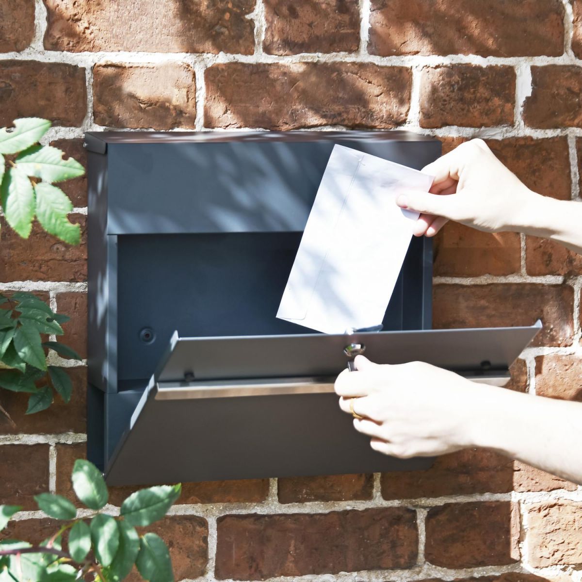 Front Opening in Use on Grey & Silver "Harmonious" Wall Mounted Post Box & Newspaper Holder
