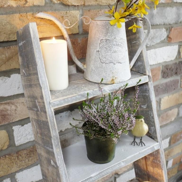 Close-Up of Storage Options for Grey Wooden Decorative Ladder