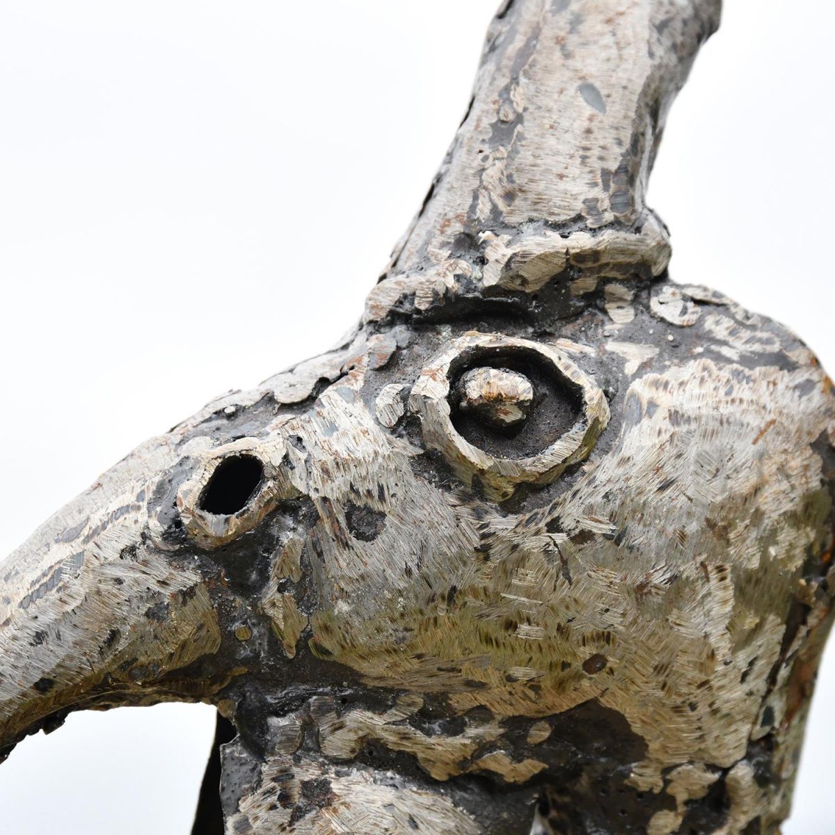 Close-up of the Head of the Guinea Fowl Recycled Metal Garden Sculpture Close-up of the Head of the Guinea Fowl Recycled Metal Garden Sculpture