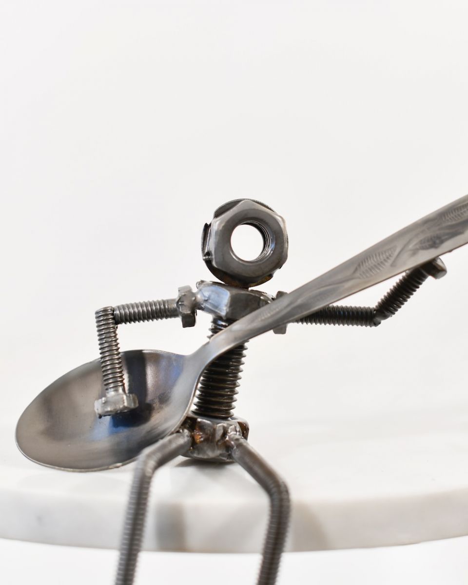 Close up of intricate detail in scrap metal interior ornament Close up of intricate detail in scrap metal interior ornament