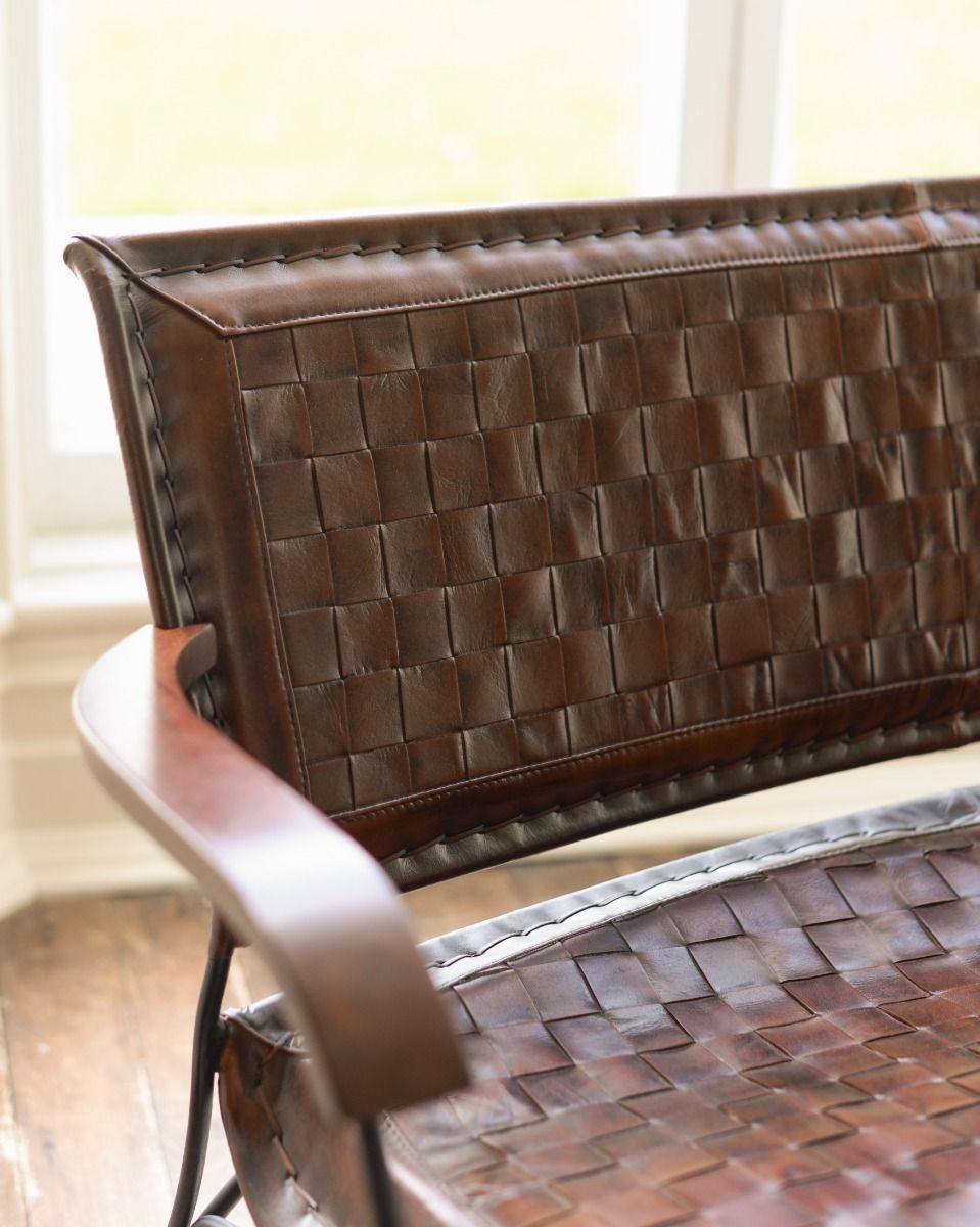 Hand Woven Tan Leather and Iron Two Seater Chair Backrest Focus