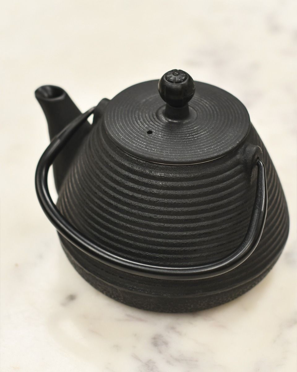 Cast Iron Black Teapot Handle Down