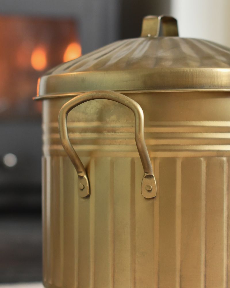 Close Up Of The Handle On The Gold Log Basket Close Up Of The Handle On The Gold Log Basket