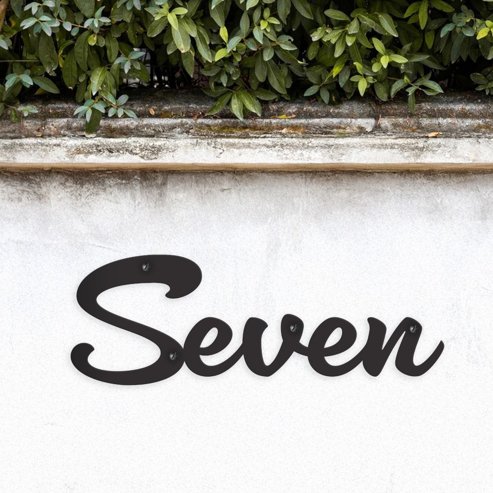 Black Handwritten House Number Sign on Garden Wall