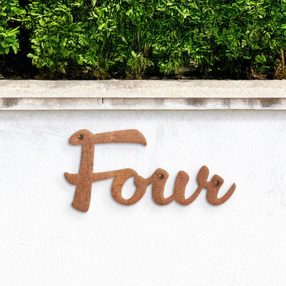 Rustic Handwritten House Number Sign on garden wall