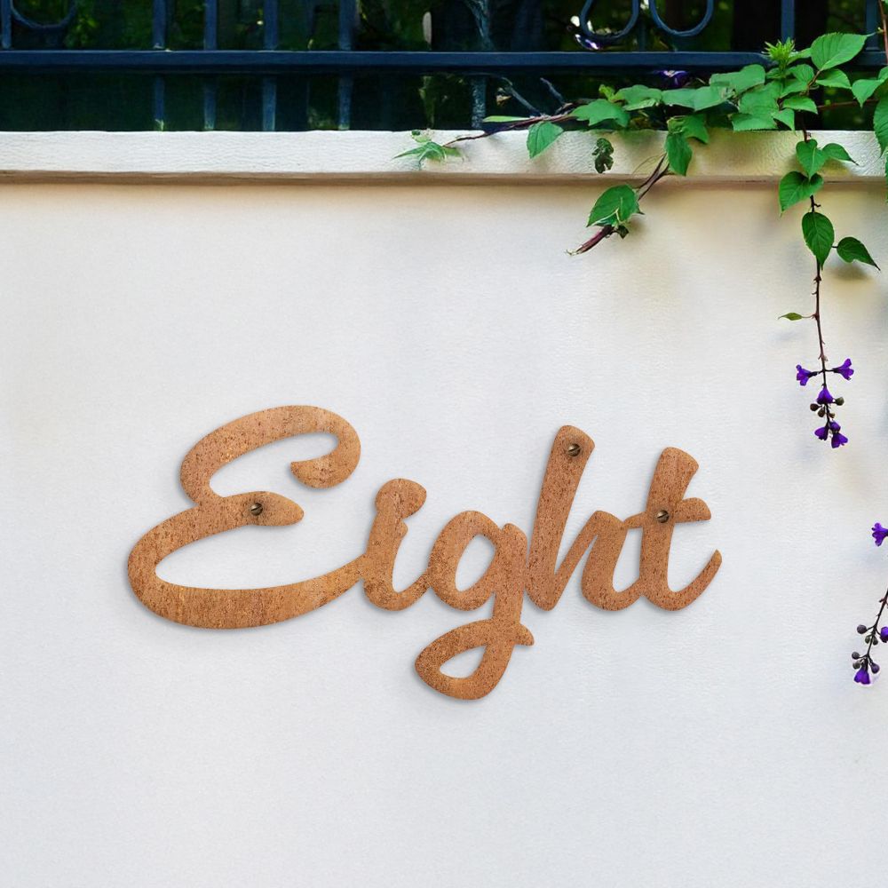 Rustic Handwritten House Number Sign on white wall