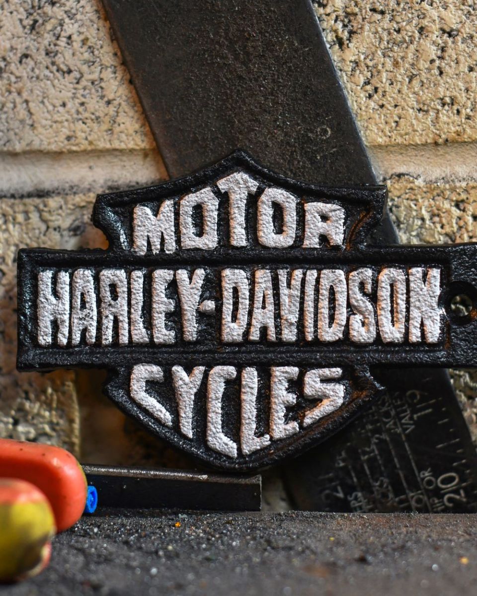 Close up of Harley Davidson Garage Vintage Style Cast Iron Sign finish
