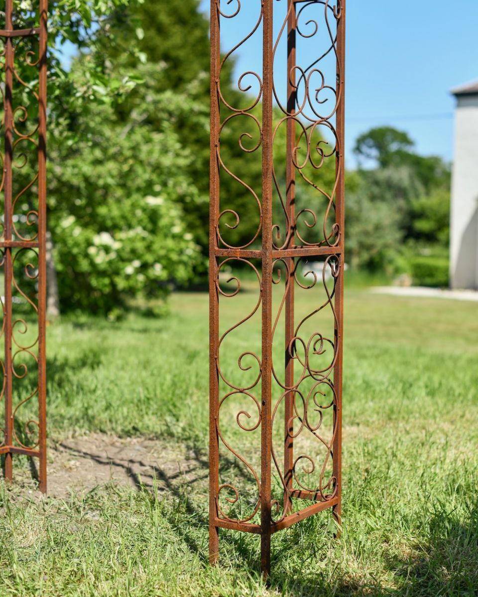 Close up of ornate leg detail on rose arch Close up of ornate leg detail on rose arch