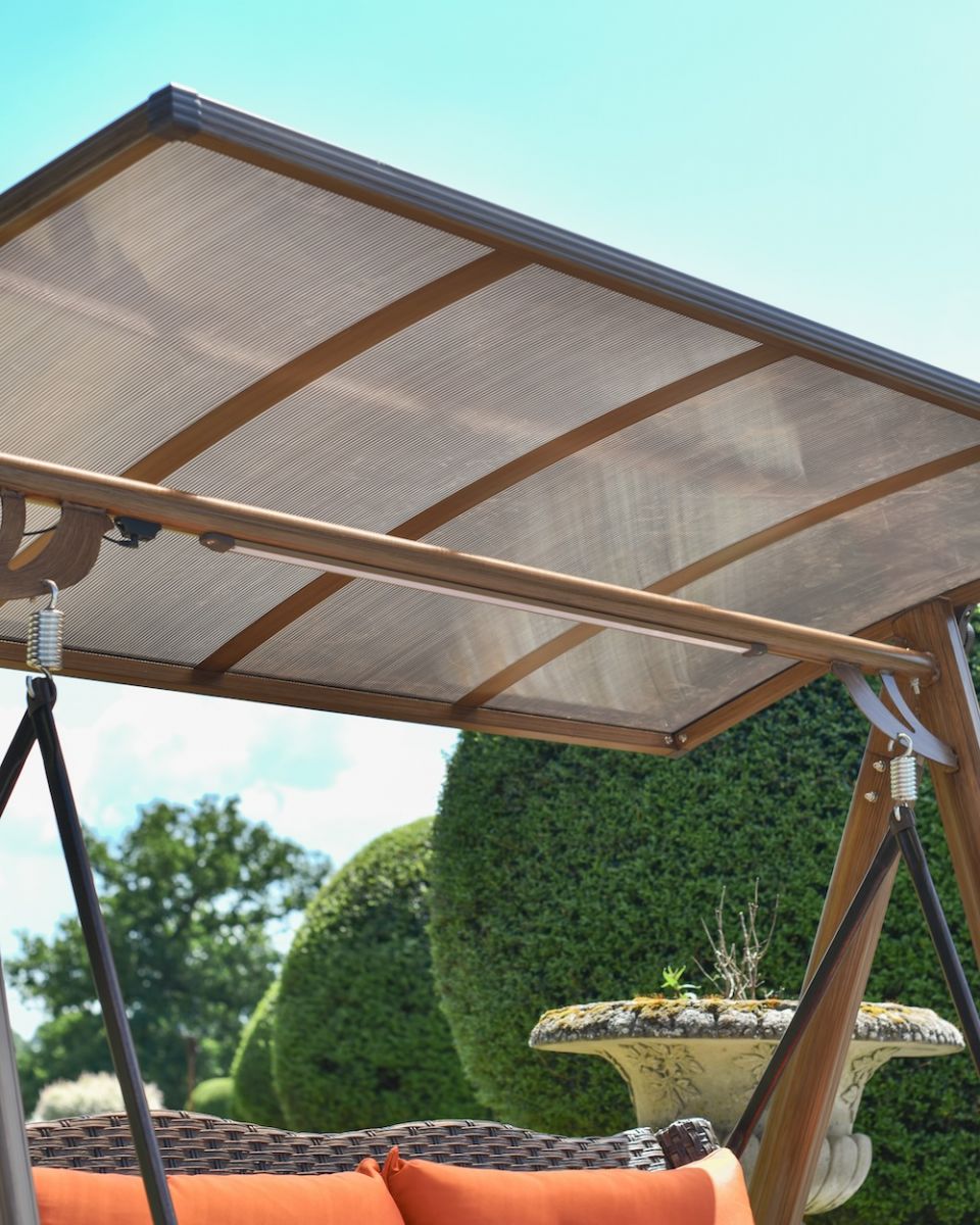 Close up of shaded roof detail on patio swing seat Close up of shaded roof detail on patio swing seat