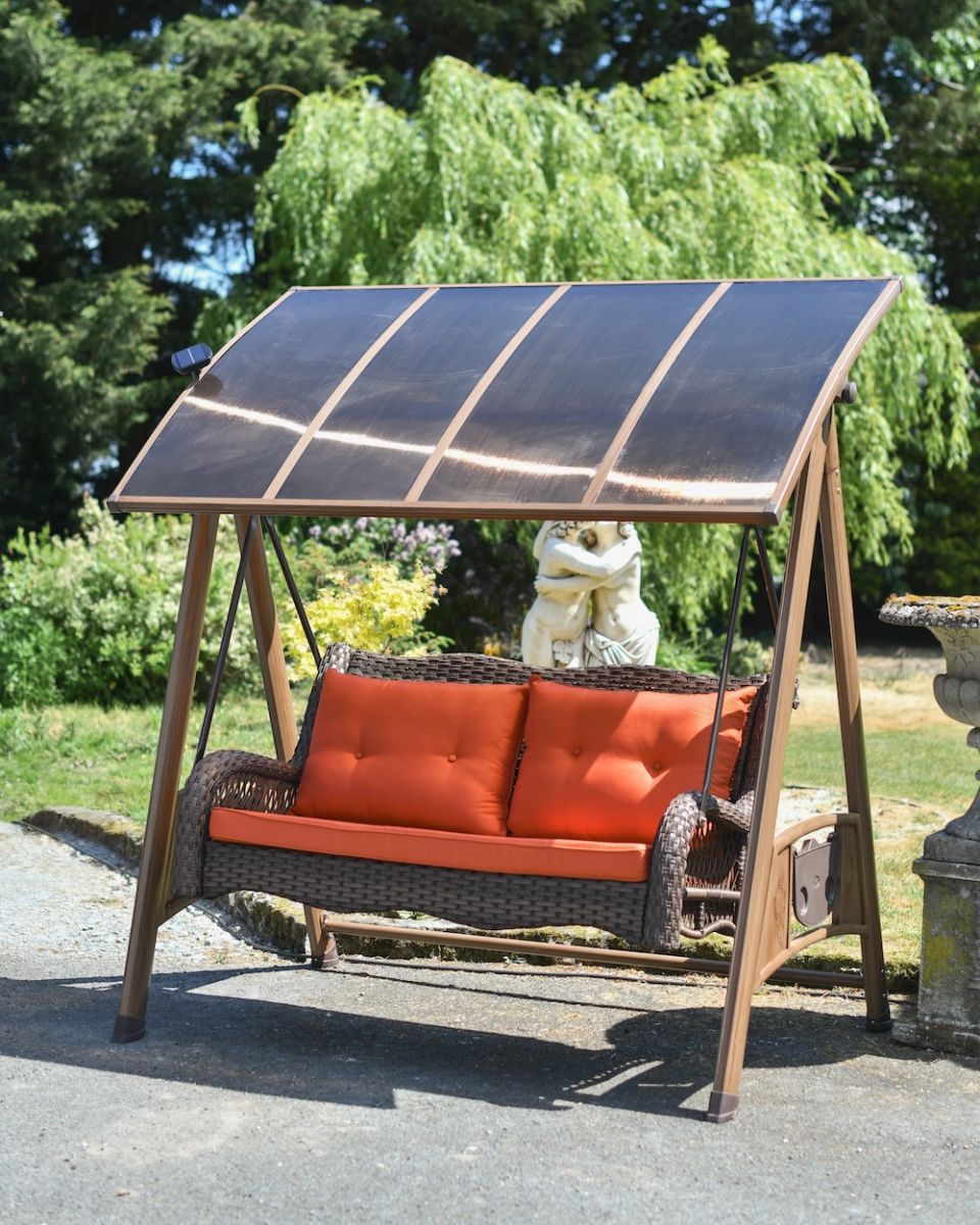View of shaded swing seat with moveable roof View of shaded swing seat with moveable roof