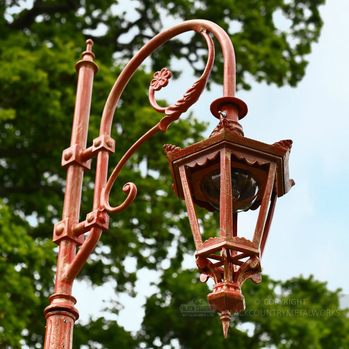 Hexagonal Lantern on ornate scrolled lamp post column