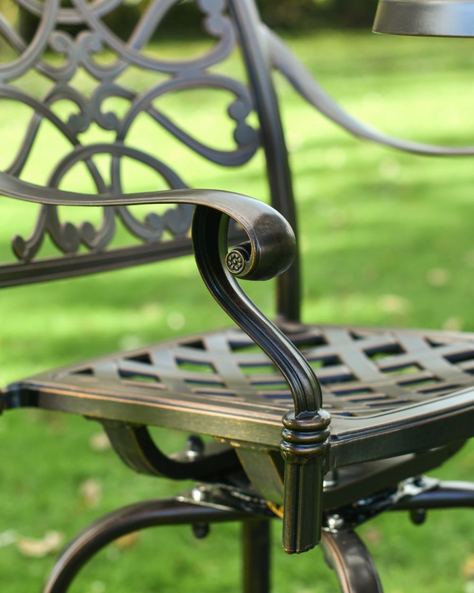 Close up of scroll detailing on chair arm Close up of scroll detailing on chair arm