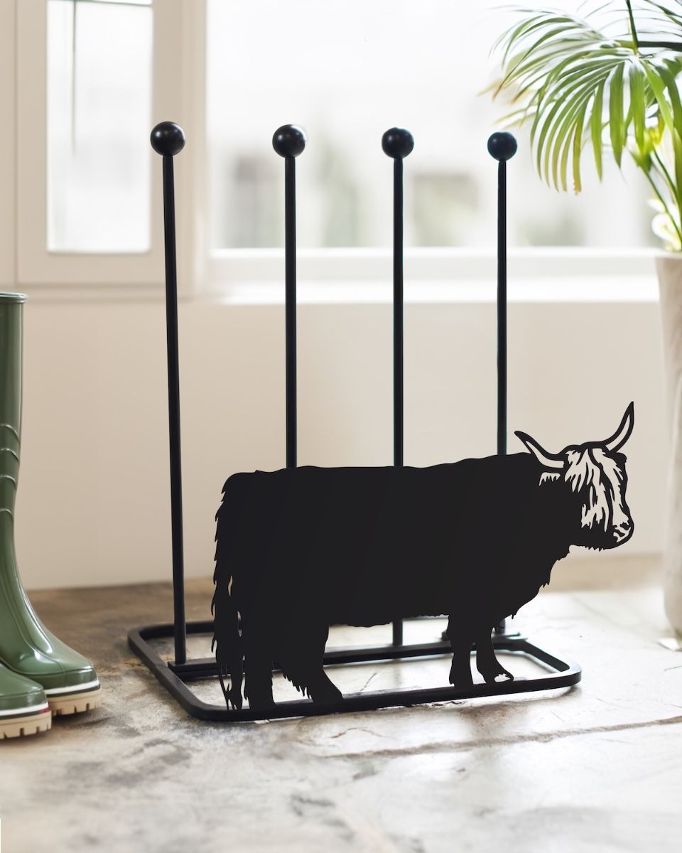 Highland Cow Double Welly Boot Rack in a hallway