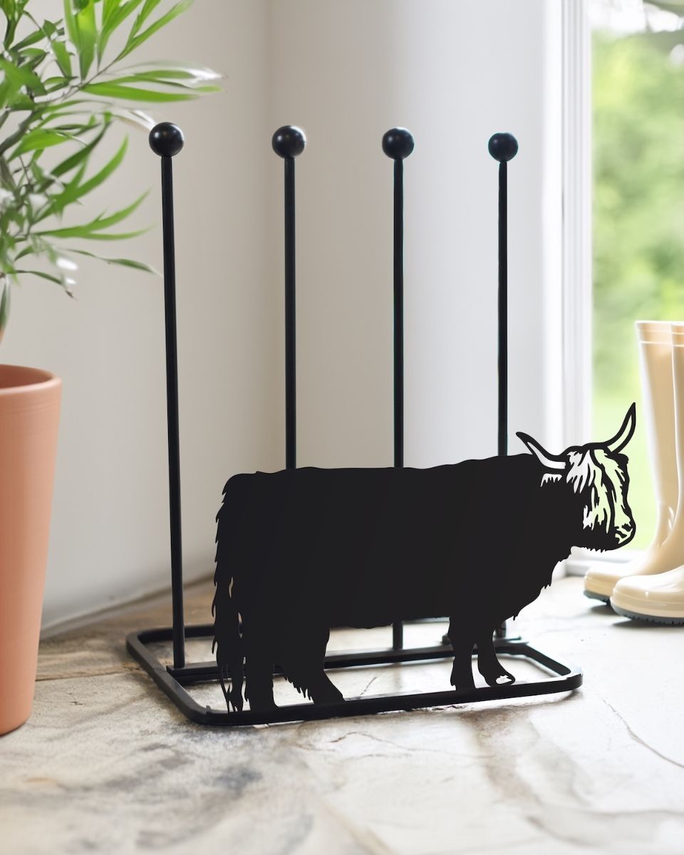 Highland Cow Double Welly Boot Rack in a door way