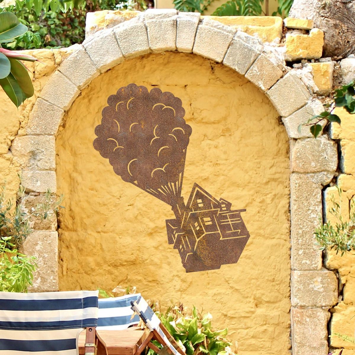 Floating House on Balloons Steel Wall Art on a Yellow Wall