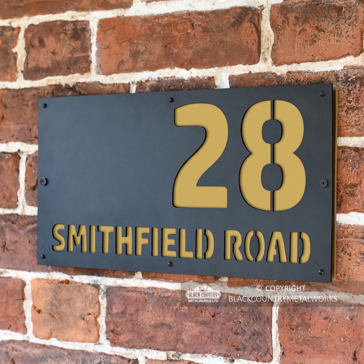 Sand Yellow "Smithfield" House Sign in Situ on the Wall Sand Yellow "Smithfield" House Sign in Situ on the Wall