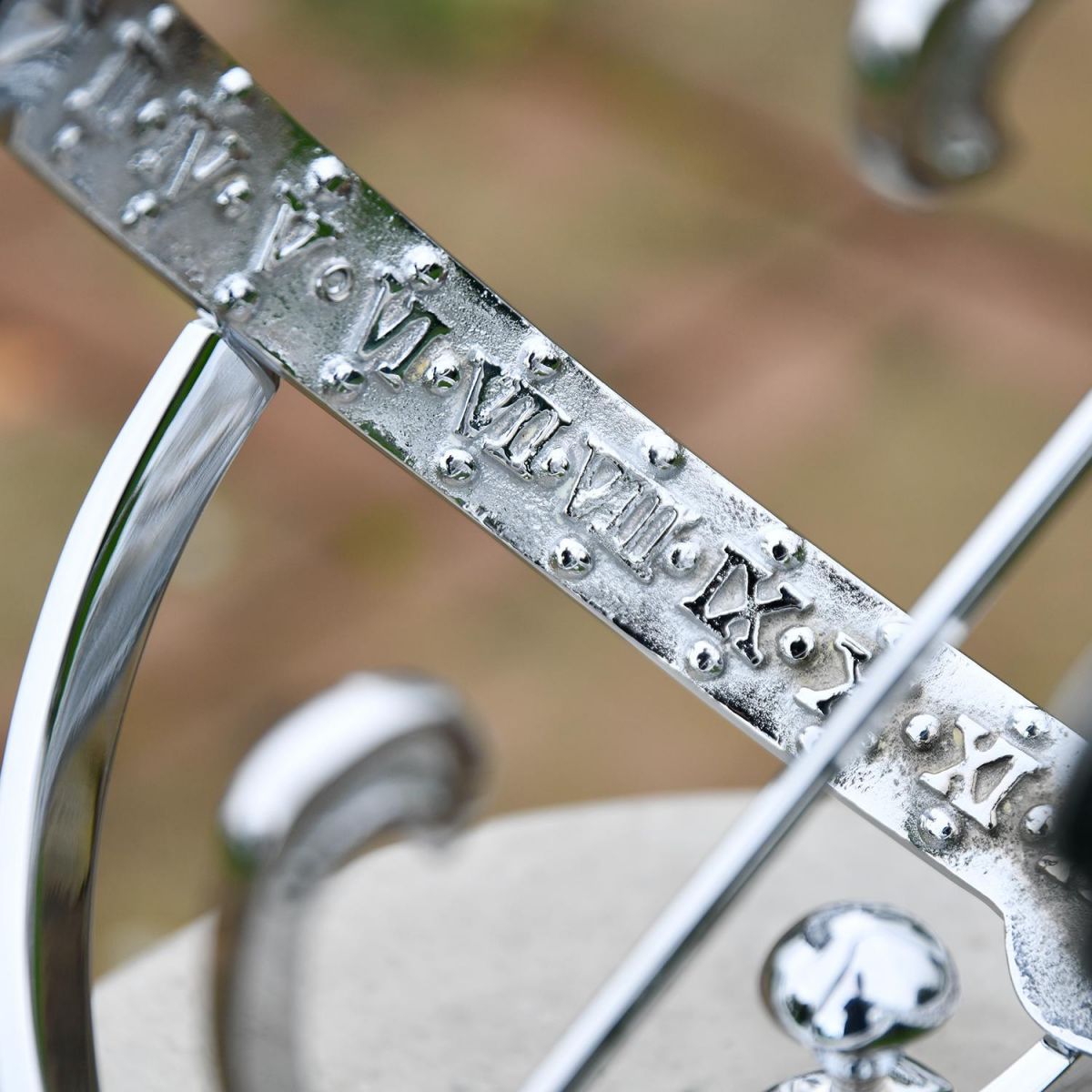 Close up of Roman Numeral Embossed Detailing 