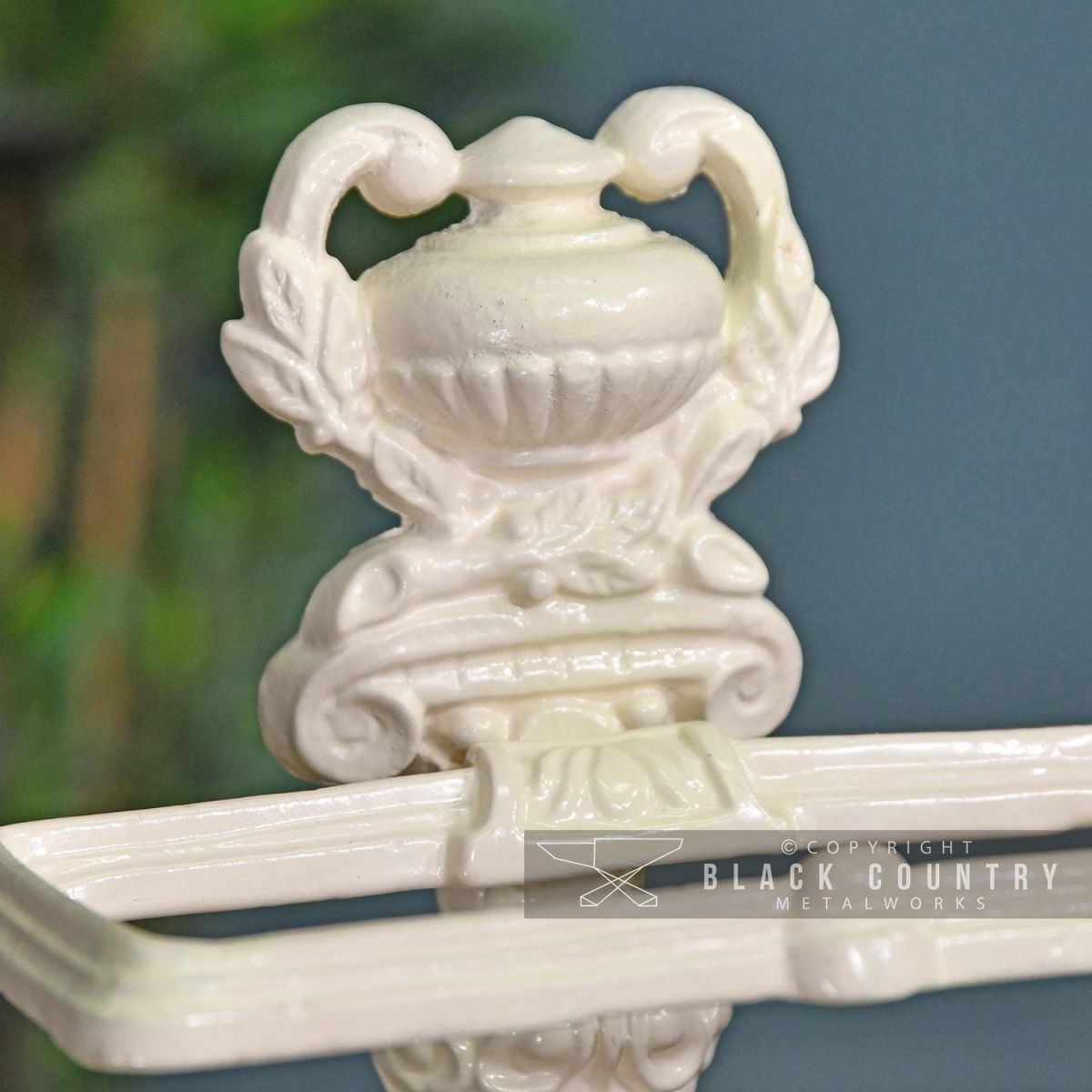 Ornate Urn Shaped Design on the Top of the Umbrella stand